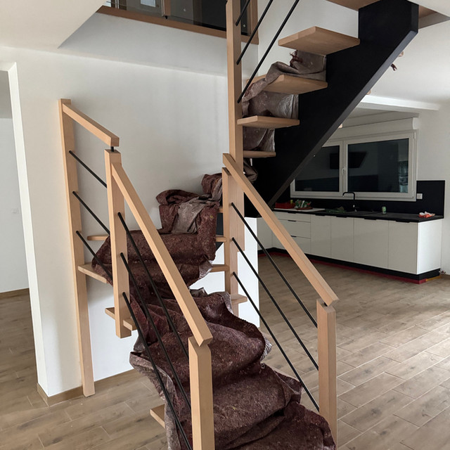 Escalier limon central bois hêtre